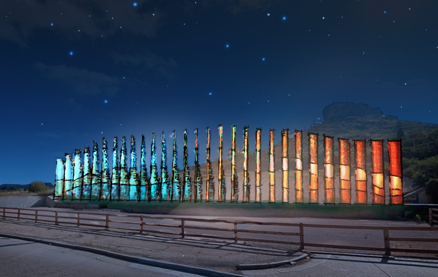 The sculpture lit at night