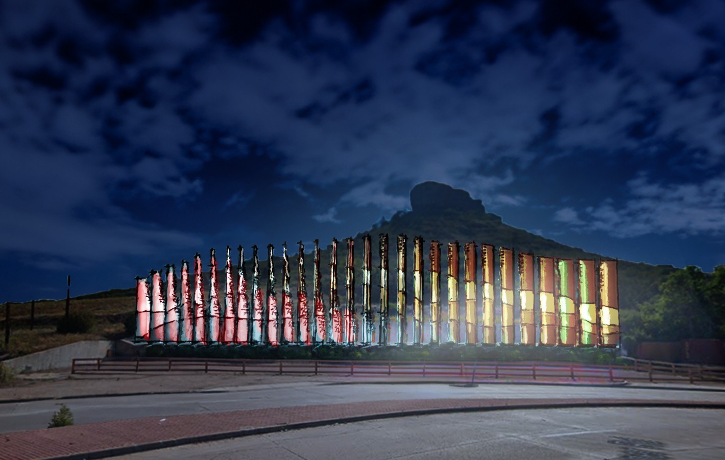 The sculpture lit at night, a second color setting